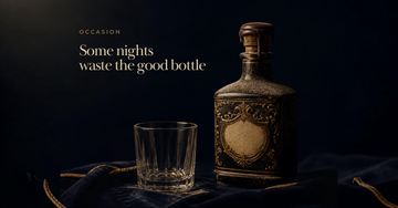 An ornate old bottle with a wax sealed cork sits untouched on velvet cloth beside a plain everyday glass — Some nights waste the good bottle