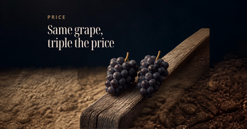 Two identical grape clusters rest on a weathered fence post splitting the frame diagonally, soil texture shifting across it — Same grape, triple the price