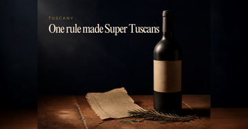 An Italian wine bottle stands beside a torn rulebook page and scattered dried rosemary sprigs on terracotta tile — One rule made Super Tuscans