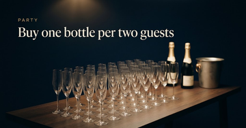 Thirty champagne flutes arranged in tight rows across a long dark table, two unopened bottles and an ice bucket at one end — Buy one bottle per two guests