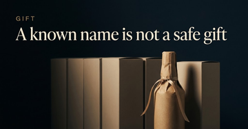 An unopened whisky bottle wrapped in plain brown paper with loose ribbon, set apart from a row of identical plain boxes — A known name is not a safe gift
