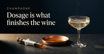 A dosage syringe beside a shallow copper dish of syrup and a coupe glass catching low light, pale bubbles rising — Dosage is what finishes the wine
