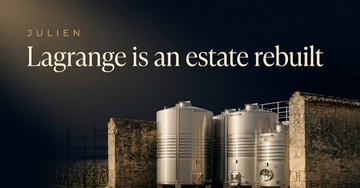 New steel fermentation tanks standing beside an old stone chateau wall, scaffolding shadow falling across vine rows — Lagrange is an estate rebuilt